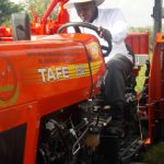 Ugandan President on a TAFE tractor