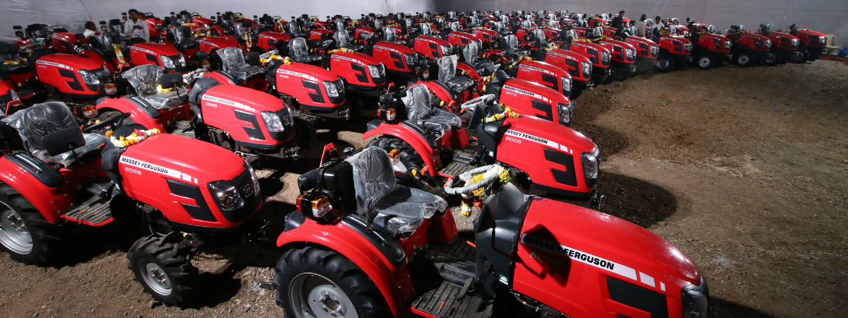 A fleet of MF 6028 - premium compact utility tractors that were delivered to over 100 farmers in Nashik Maharashtra